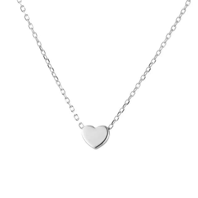 Elegant heart-shaped necklace in silver finish, displayed on a white background. A signature piece from the best jewelry store online in Pakistan.