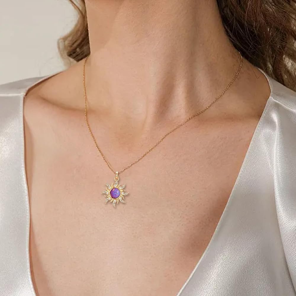 rapunzul Necklace with a sun-shaped pendant featuring a purple gemstone on a neutral background