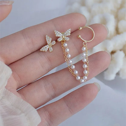 Side view of hanging butterfly ear cuff showing fine 18K gold plating and delicate craftsmanship — Eva & Esh signature style.