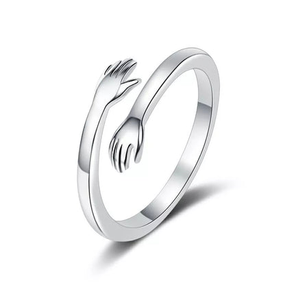 Romantic couple hug ring – elegant brass adjustable band from affordable artificial jewellery in Pakistan - Silver