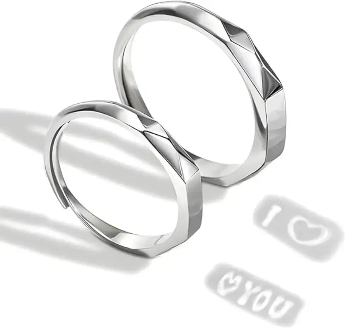 Elegant Light Sculpted Couple Rings Set on a jewelry display – shop now at Artificial Jewellery Online in Pakistan