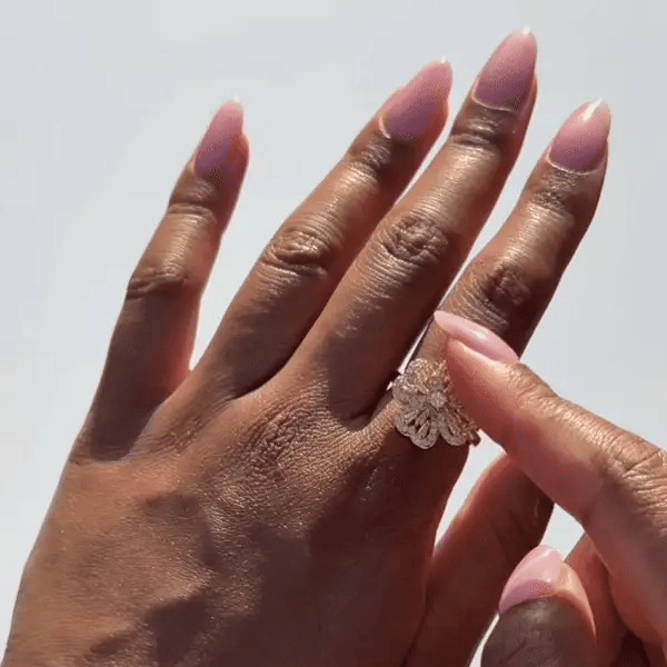Hand wearing a decorative ring with a clear background - Affordable artificial jewellery in pakistan