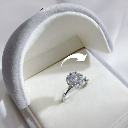Elegant Floral Spinner Ring For Women in a white jewelry box with a gray interior