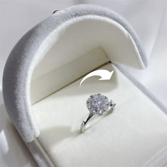 Elegant Floral Spinner Ring For Women in a white jewelry box with a gray interior