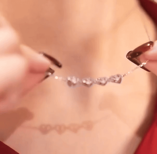 Folding heart magnetic necklace transforming into four-leaf clover – affordable artificial jewellery in Pakistan