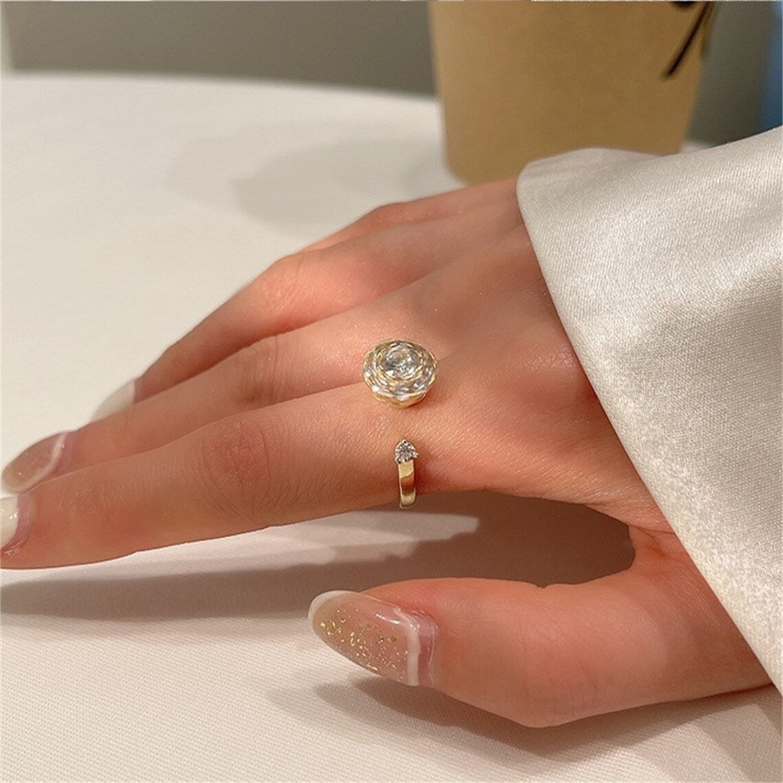 Glamorous Zircon Spinning Ring for Women with elegant floral design, sparkling zircon accents Featured collection at the Best Jewelry Store Online in Pakistan.