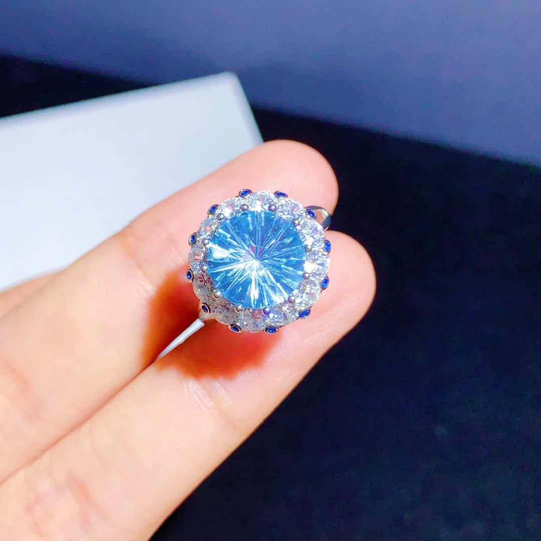 Woman wearing 5 Carat Sky Blue Topaz ring, styled for elegance – Best Jewelry Store Online in Pakistan