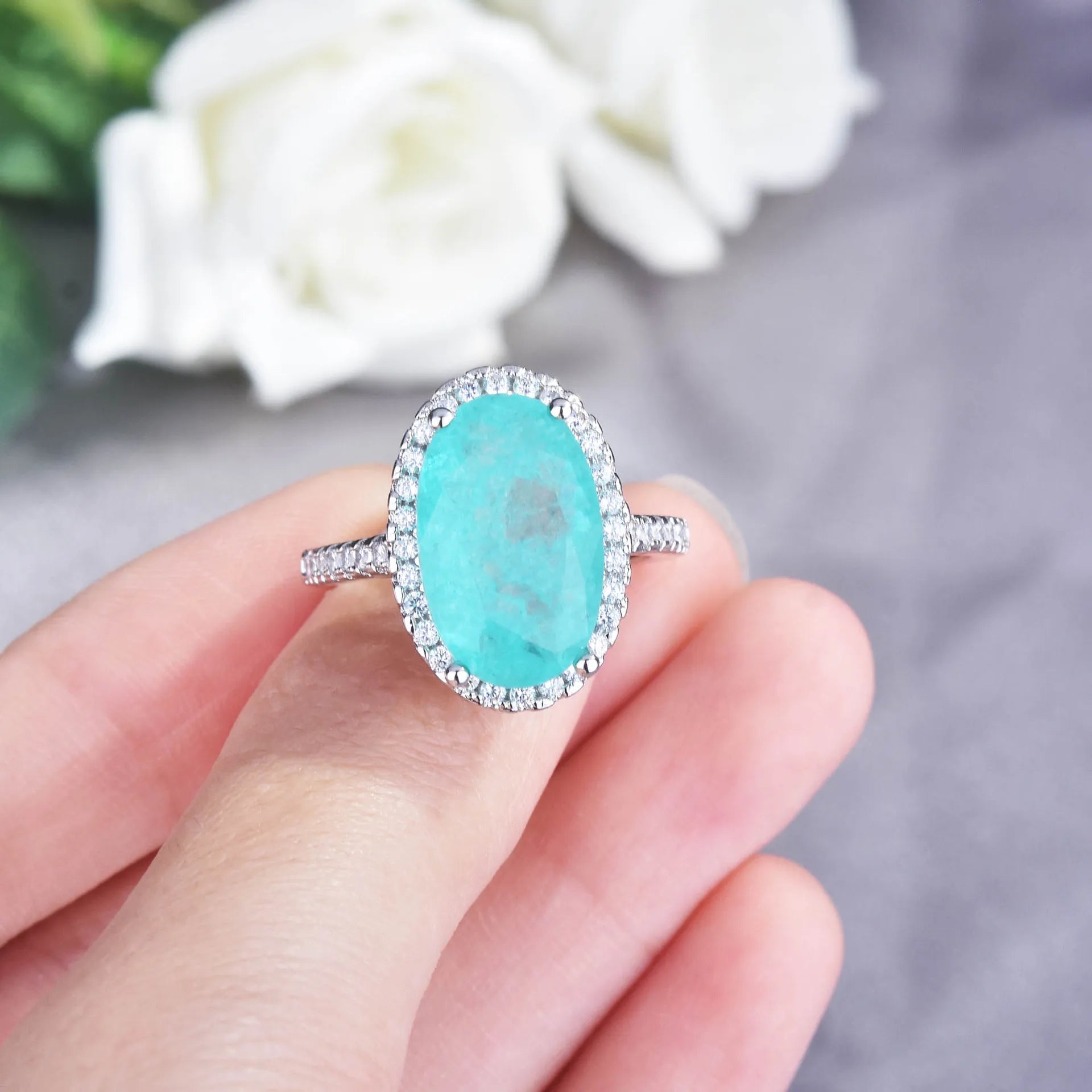Close-up of oval-shaped Paraiba tourmaline stone on sterling silver ring – Best Jewelry Store Online in Pakistan