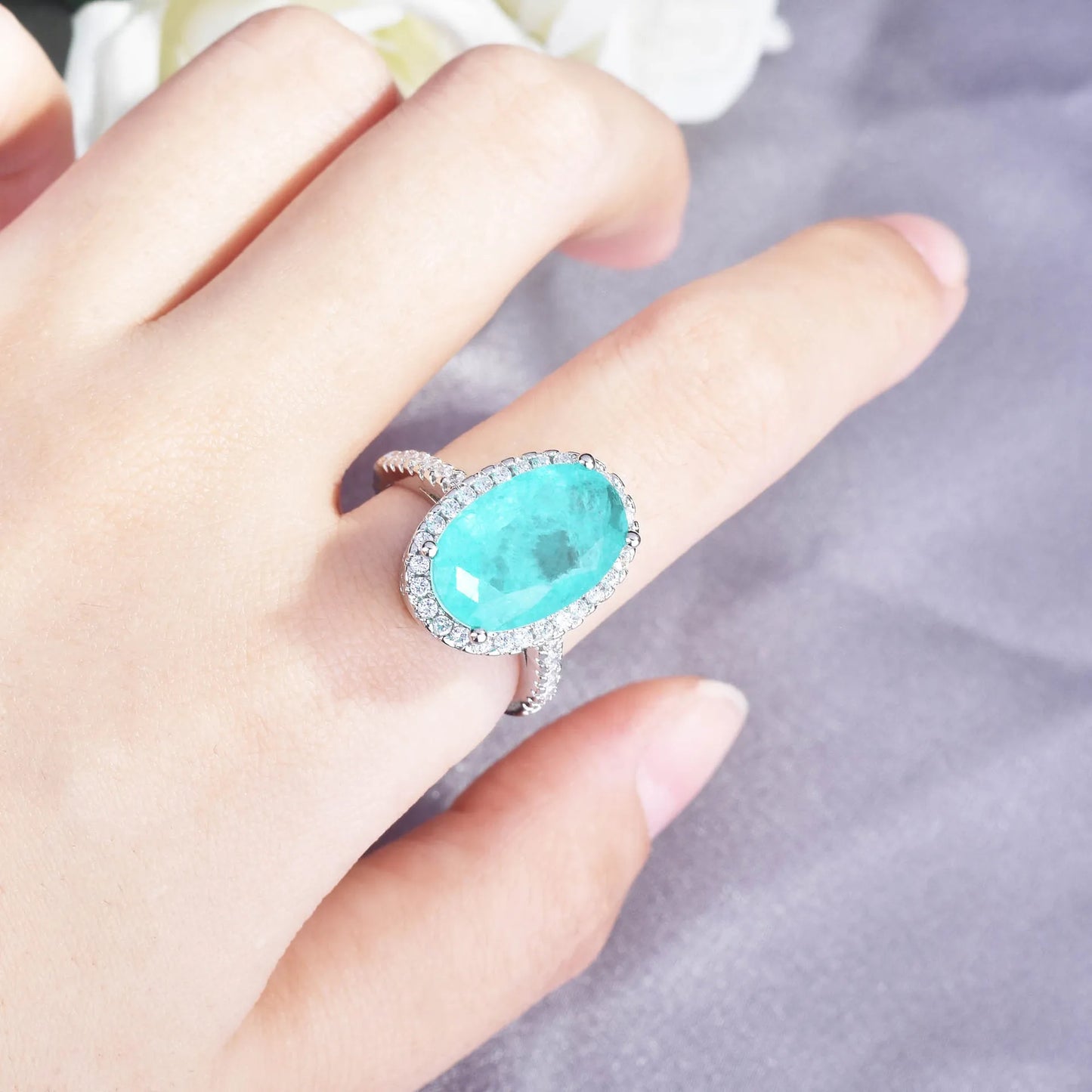 Elegant lab diamond and Paraiba ring worn on hand – Best Jewelry Store Online in Pakistan