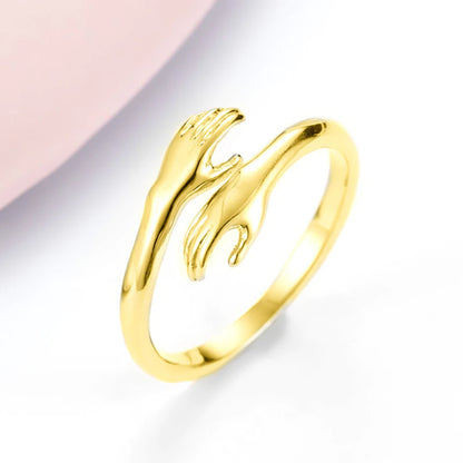 Romantic couple hug ring – elegant brass adjustable band from affordable artificial jewellery in Pakistan - Gold