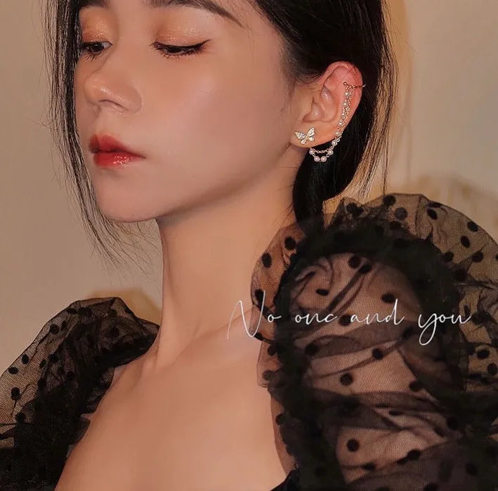 Woman wearing butterfly ear cuff, no piercing needed — a chic, standout piece from the best jewelry store online in Pakistan. Left