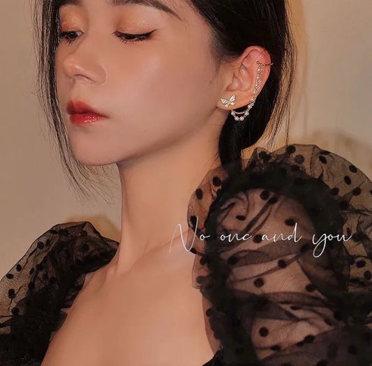 Woman wearing butterfly ear cuff, no piercing needed — a chic, standout piece from the best jewelry store online in Pakistan. Left
