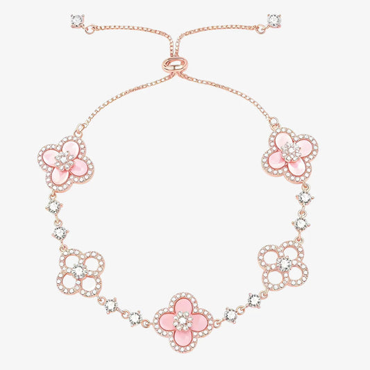 Necklace with pink floral designs and rose gold chain on a white background