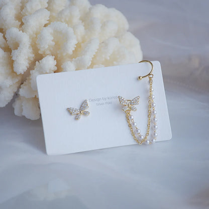 Elegant butterfly clip ear cuff with zircon and pearl details, gold-plated finish — from the best jewelry store online in Pakistan.