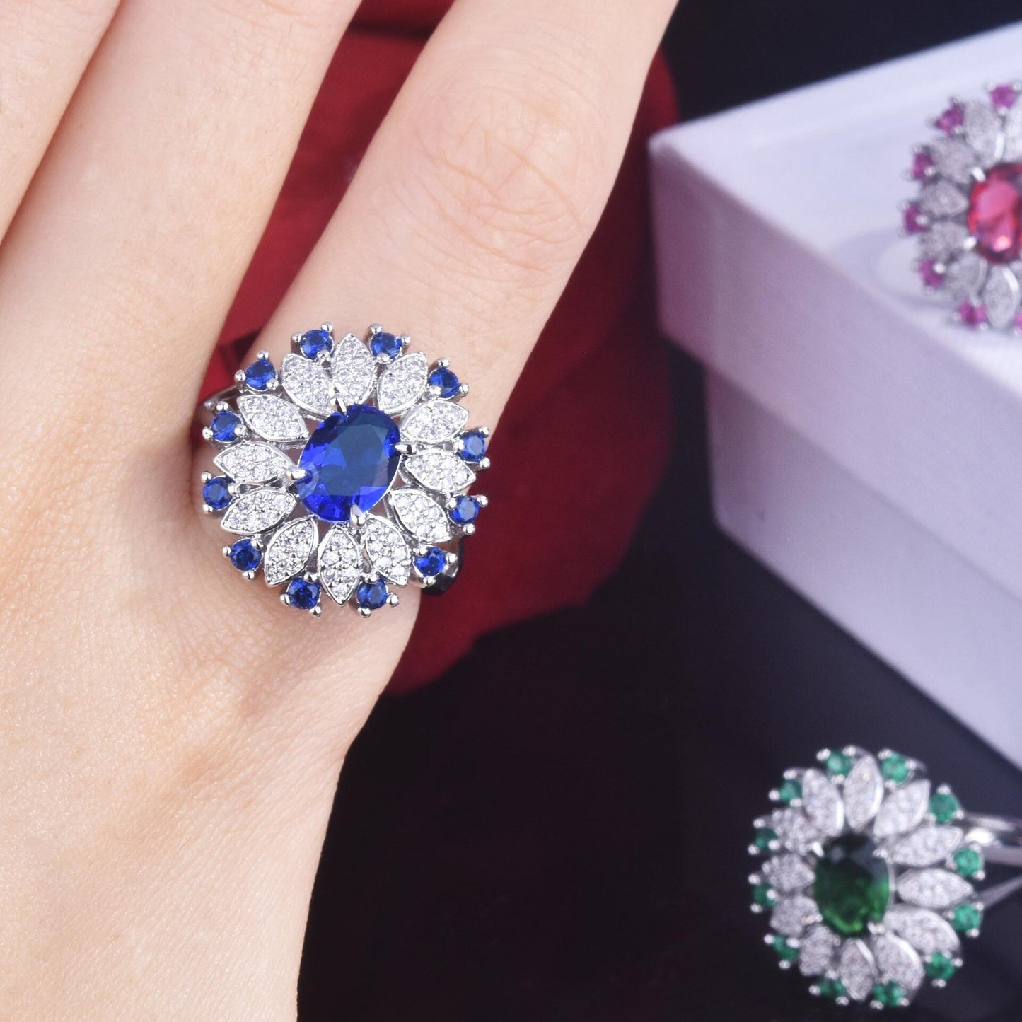 Woman wearing sapphire silver ring – stylish engagement or anniversary gift