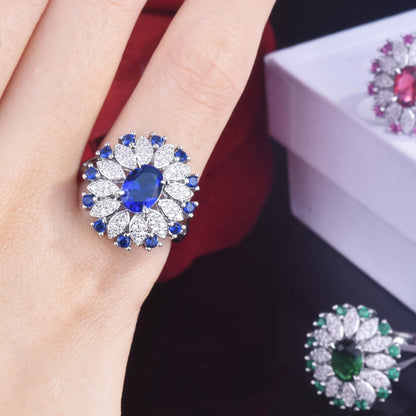 Woman wearing sapphire silver ring – stylish engagement or anniversary gift