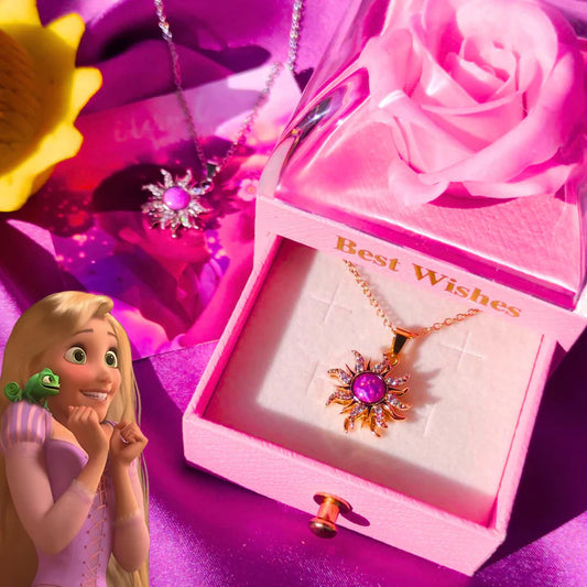 Jewelry box with a rapunzul necklace, cartoon character, and flowers on a pink background