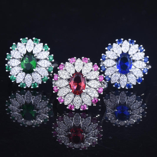 Close-up of S925 silver ring with 2 carat sapphire gemstone on finger – elegant wedding jewelry