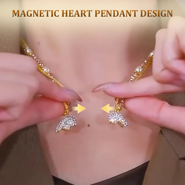 Magnetic heart pendant design being demonstrated on a necklace.