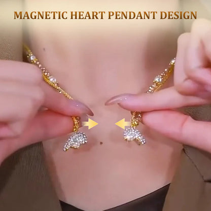 Magnetic heart pendant design being demonstrated on a necklace.