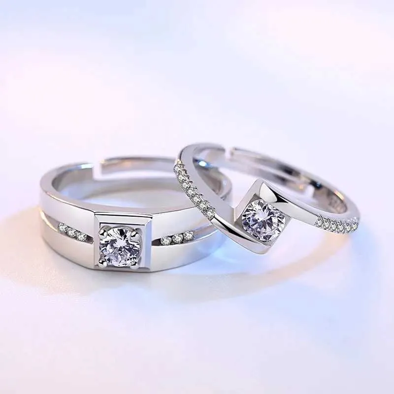 Hand wearing sterling silver couple promise ring minimalist romantic design