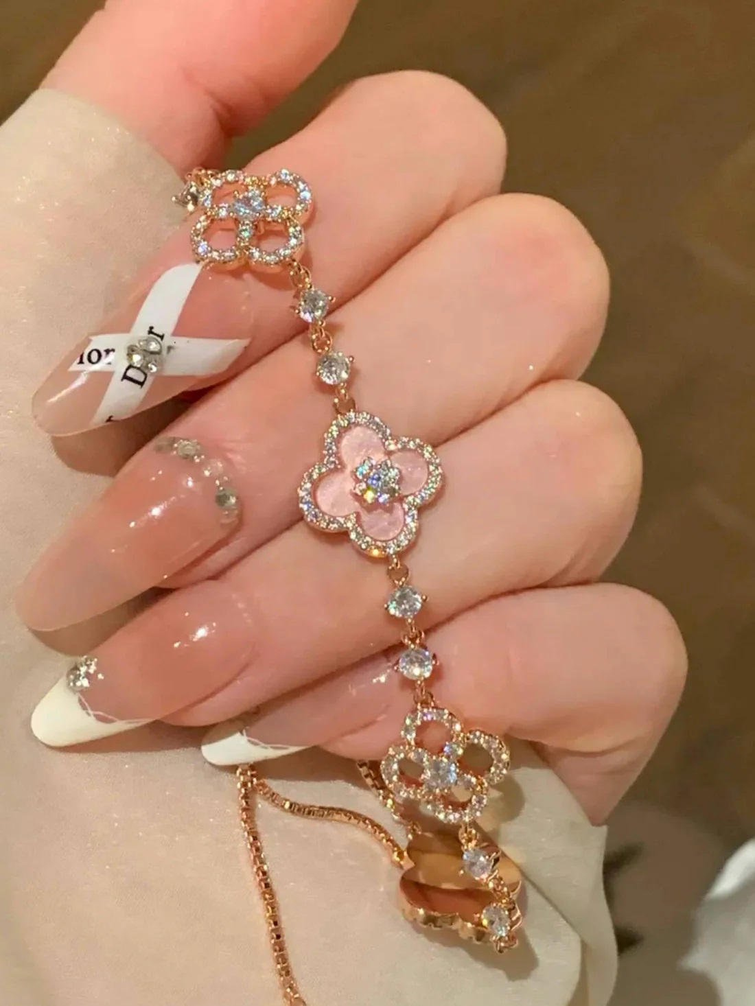 Woman wearing Sakura Cleef Bracelet Pakistan stylish floral accessory