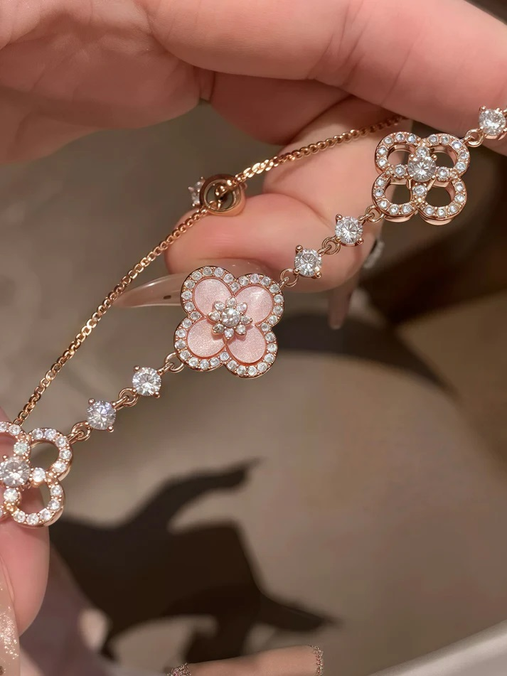 women holding Sakura Cleef Bracelet Pakistan elegant gift for women