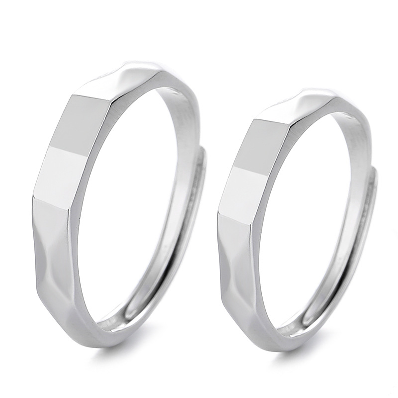 Close-up silver plated couple rings Pakistan elegant love jewelry design