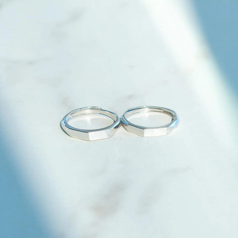 couple rings Pakistan silver matching rings for lovers at sky blue paper