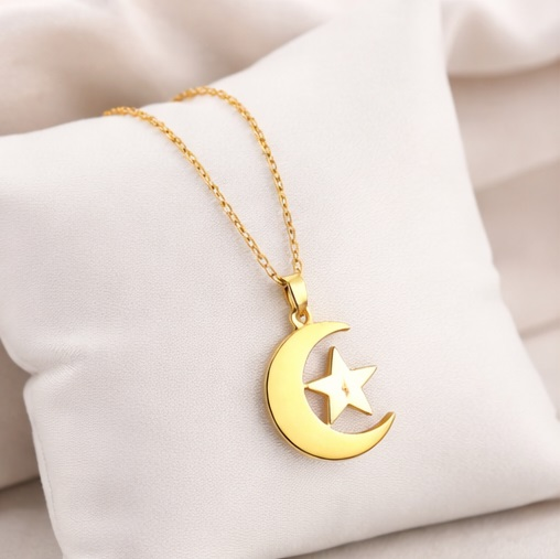 Elegant crescent star necklace Pakistan gold Islamic jewelry gift at pillow