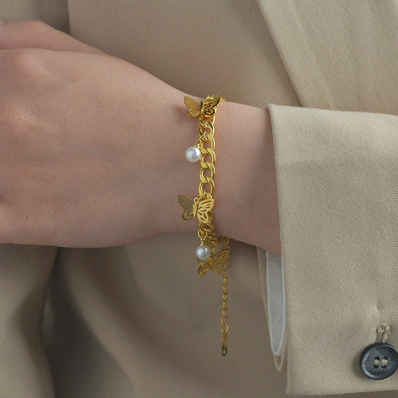 Woman wearing butterfly charm bracelet Pakistan stylish daily wear bracelet