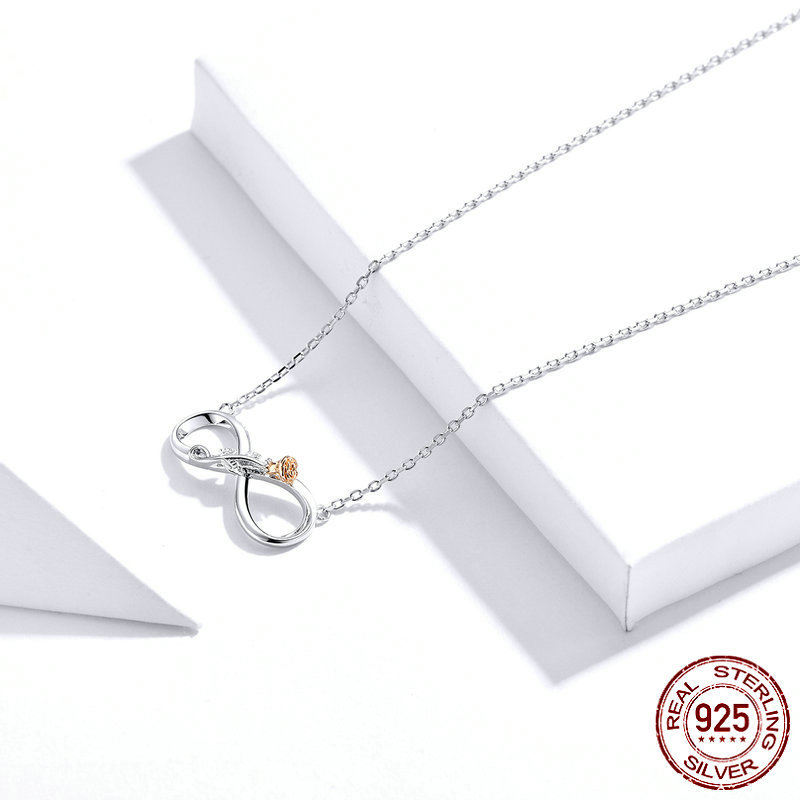 close up of 925 silver infinity necklace with rose detail for women Pakistan
